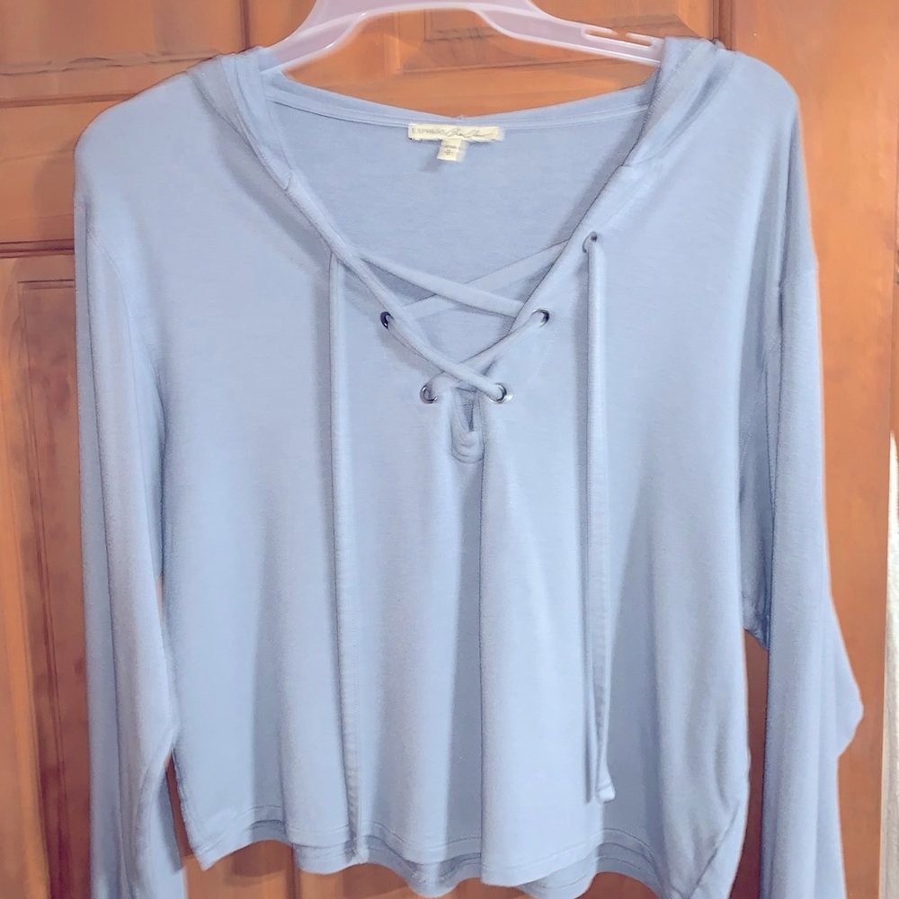 Baby blue soft material with hood & a lace up front to add a bit of sexy.